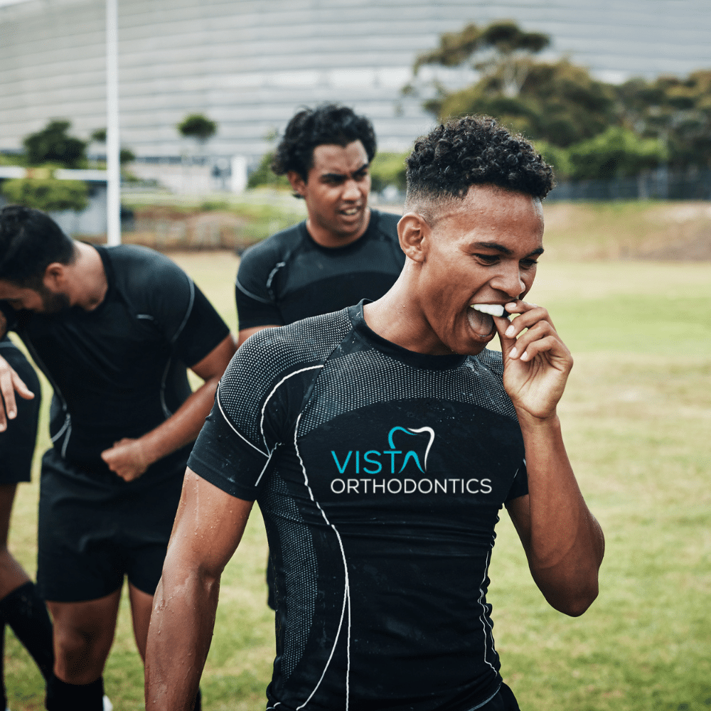 Young men with mouthguards during sports